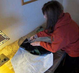 Recycling Santa Claus boot leather for the kayak