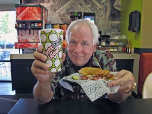 Dick showing off his Schlotzsky's sanwich