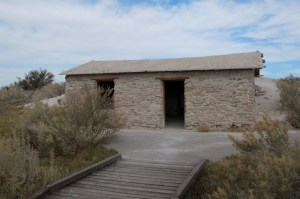 Jack Longstreet's stone house with the fossil spring mound to the right