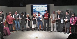 The cast is receiving votes as to who did the dastardly deed. Peachy is still sitting on her death chair, observing