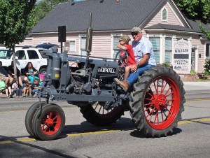 I love this picture of the grandpa with his grandson (or perhaps great-grandson?)