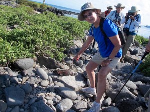Shirley and a marine iguana