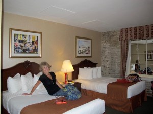 You may think you see a window with drapes, but it's really a mirror to give the illusion the room is larger than it is.