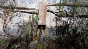 Obviously, it's been there for a long time and is still doing the job, but i think I would be leery about drinking that water.